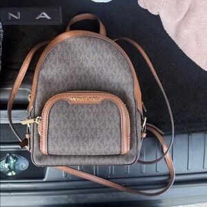Michael Kors Jaycee medium zip pocket backpack bag in brown signature
